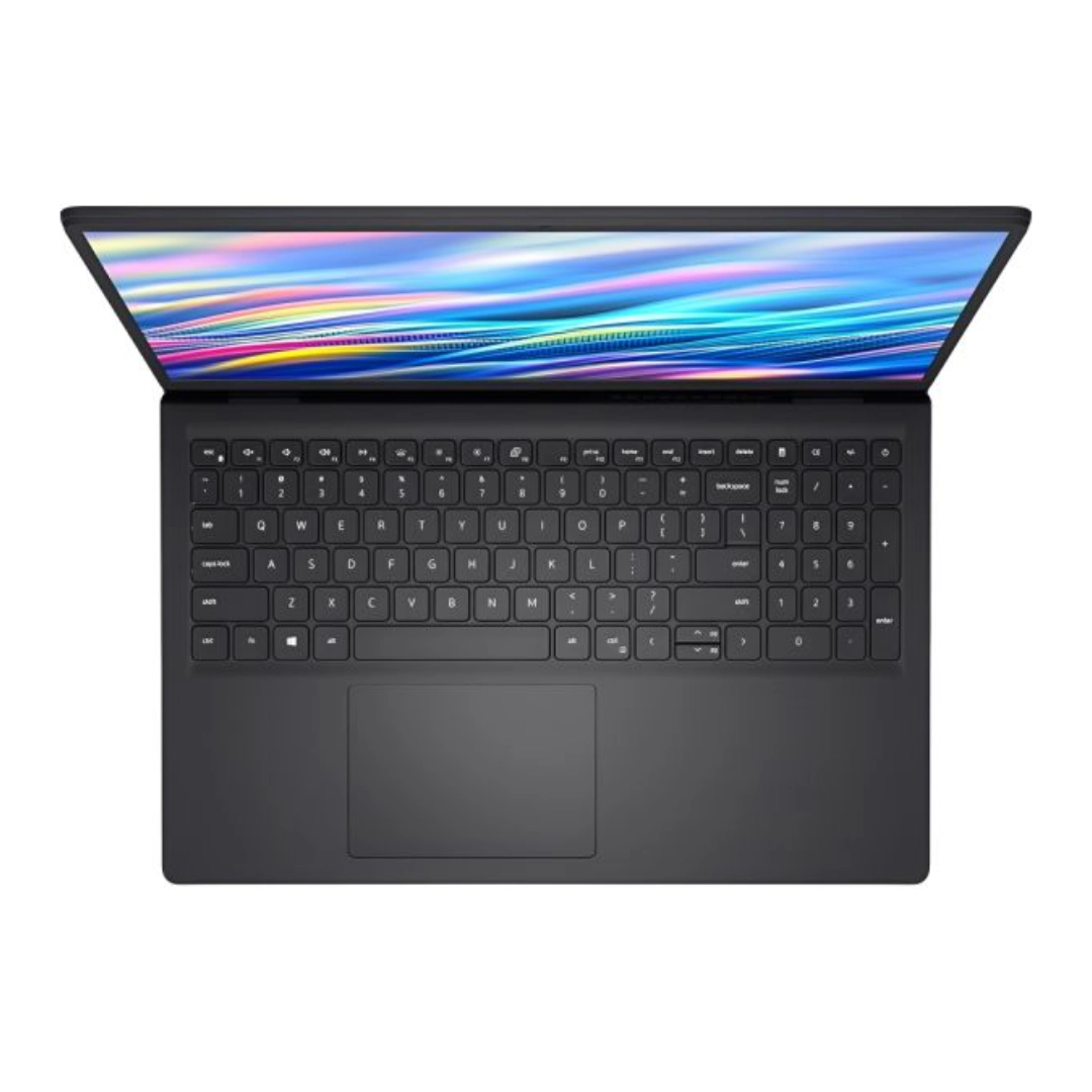 Vista desde un angulo hacia arriba donde se ve en un mejor plano el teclado del computador y parte de la pantalla