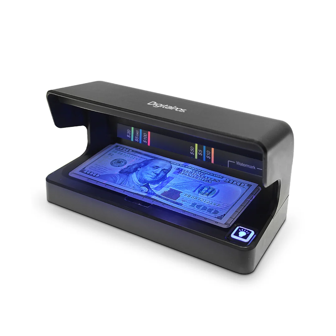 Vista del detector de billetes falsos de forma diagonal, se puede ver la luz y funcionamiento