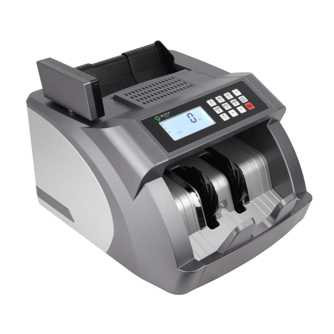 Vista en diagonal de la maquina contadora de billetes, se puede apreciar compartimentos, botones y demas