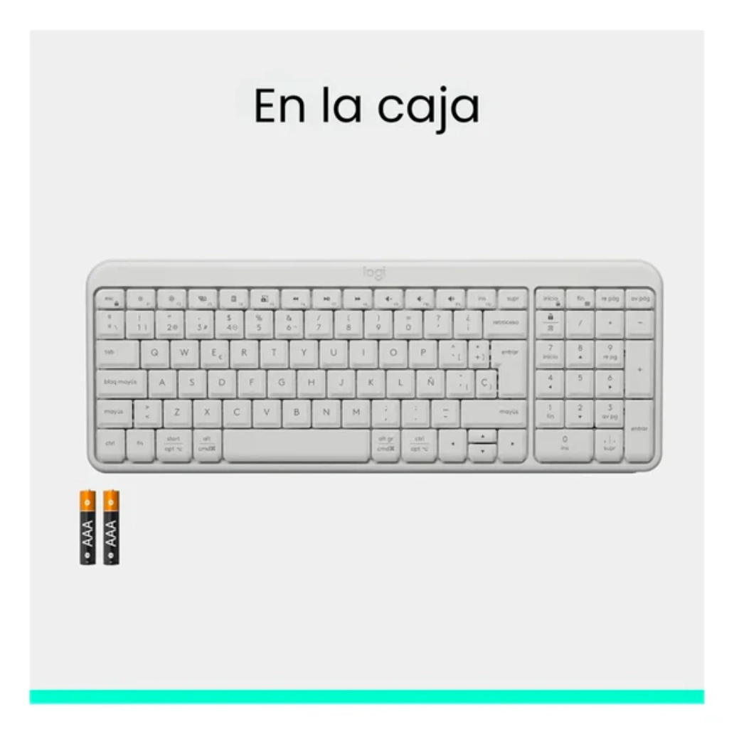 Vista del teclado junto a unas pilas, se aprecia el teclado